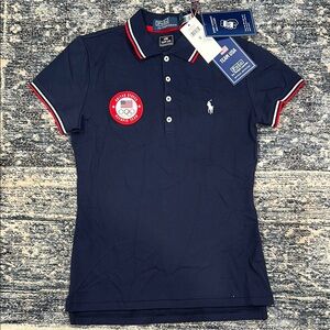Women’s Navy Polo Shirt with Red and White Accents. Official USA 2024 Olympic